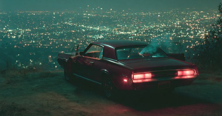 Nights Like — cover: a car parked above the city lights at night